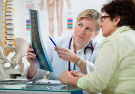 Doctor explaining x-ray results to patient